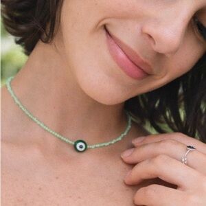 Green Beaded Necklace with Evil Eye Pendant
